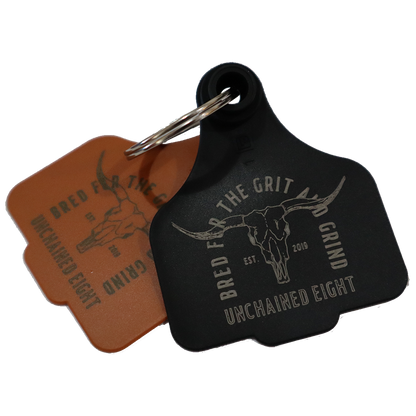Brown and Black unchained eight cattle tag keyring with classic country and western wear logo