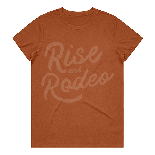 LADIES RISE AND RODEO TEE RUST