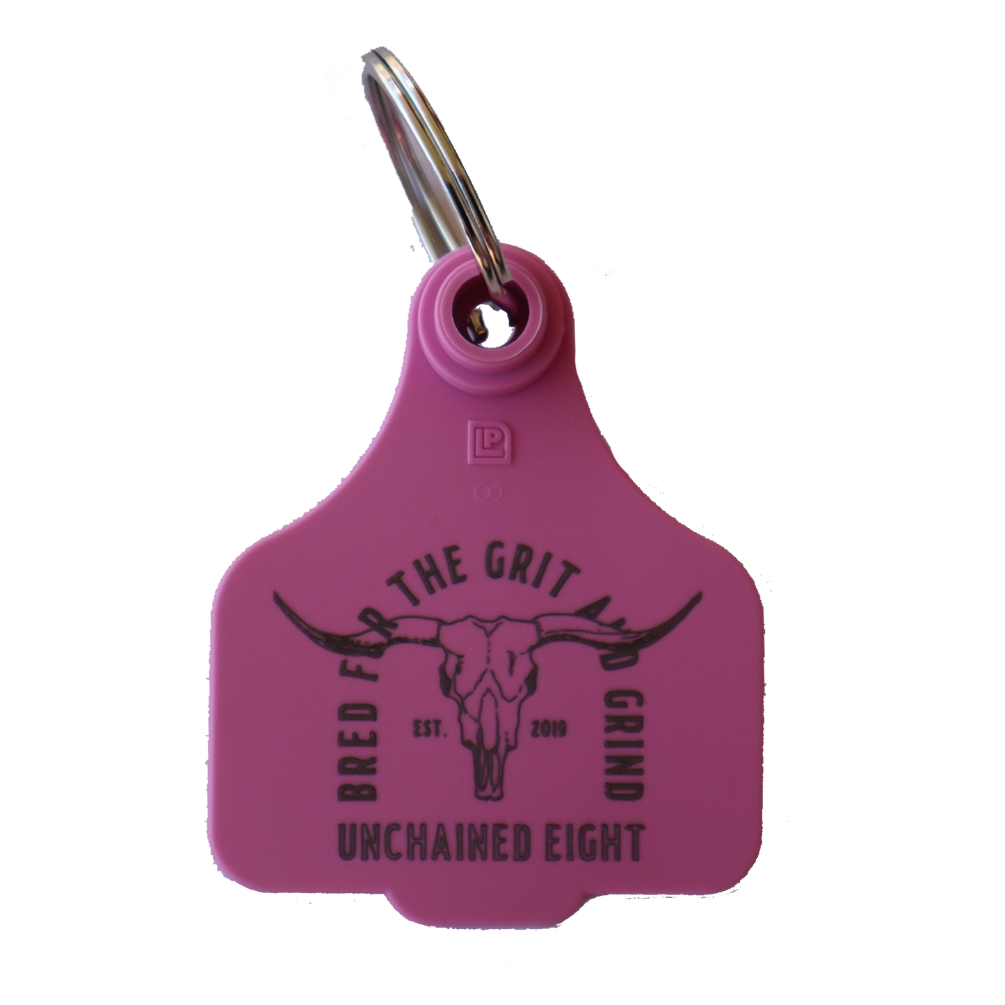 Pink unchained eight cattle tag keyring with classic country and western wear logo