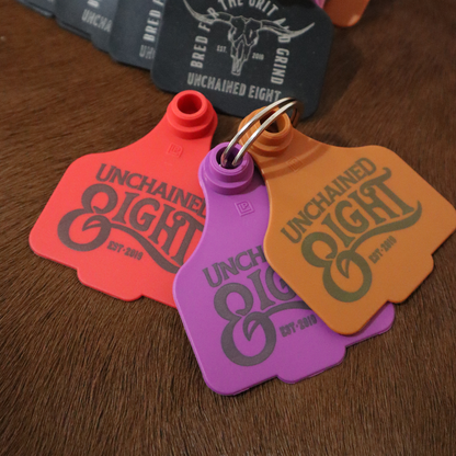 Classic country and western wear logo cattle tag keyring brown red black and purple